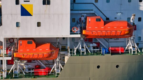 Two orange, high visibility, launch ready marine lifeboats, suspended between white launch davits on a North Sea support vessel in Aberdeen Harbour. Labour has confirmed its plans to block all North Sea oil and gas projects