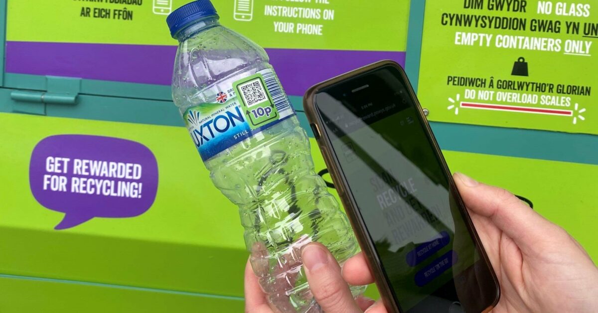 Person scanning Buxton waterbottle with mobile phone