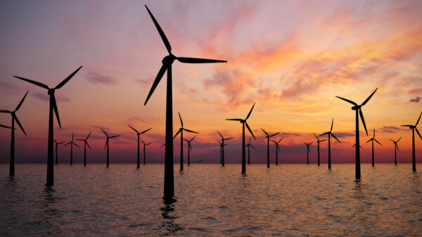 Offshore Wind Turbines Farm At sunset