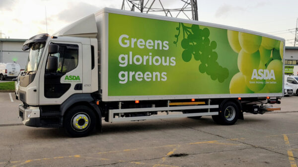 Volvo FL210 light goods vehicle in an Asda UK livery with the message greens glorious greens and an Asda logo at the rear with the phrase save money, Live better.