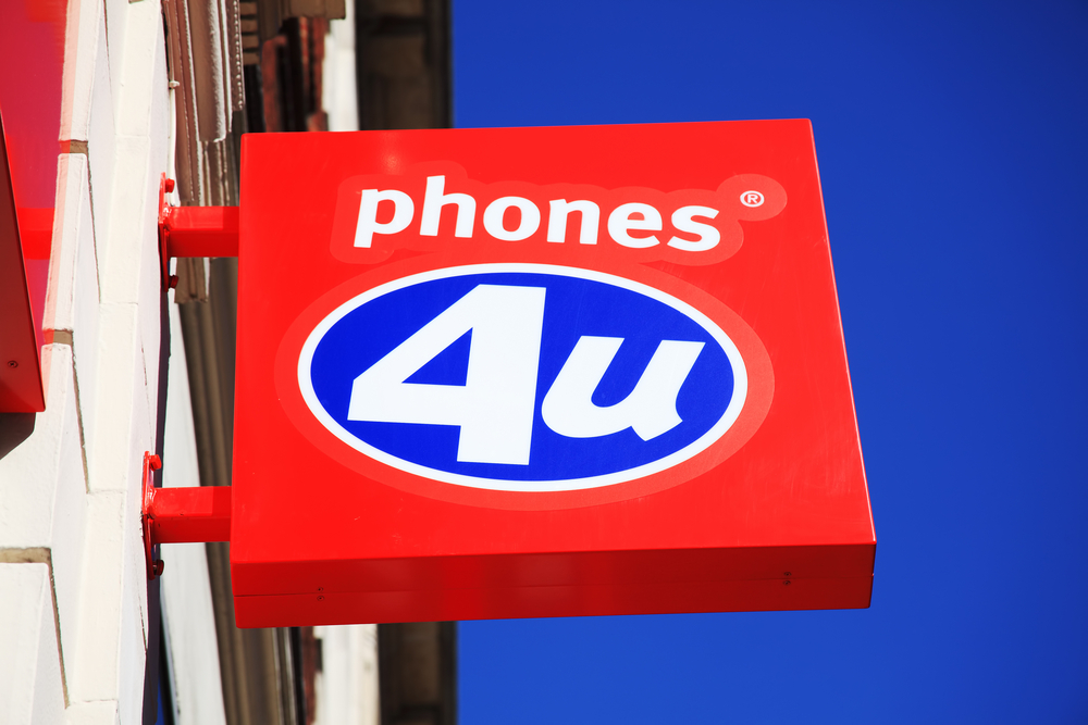 Phones 4U logo advertising sign on one of its branch retail outlets in Oxford Street John Caudwell