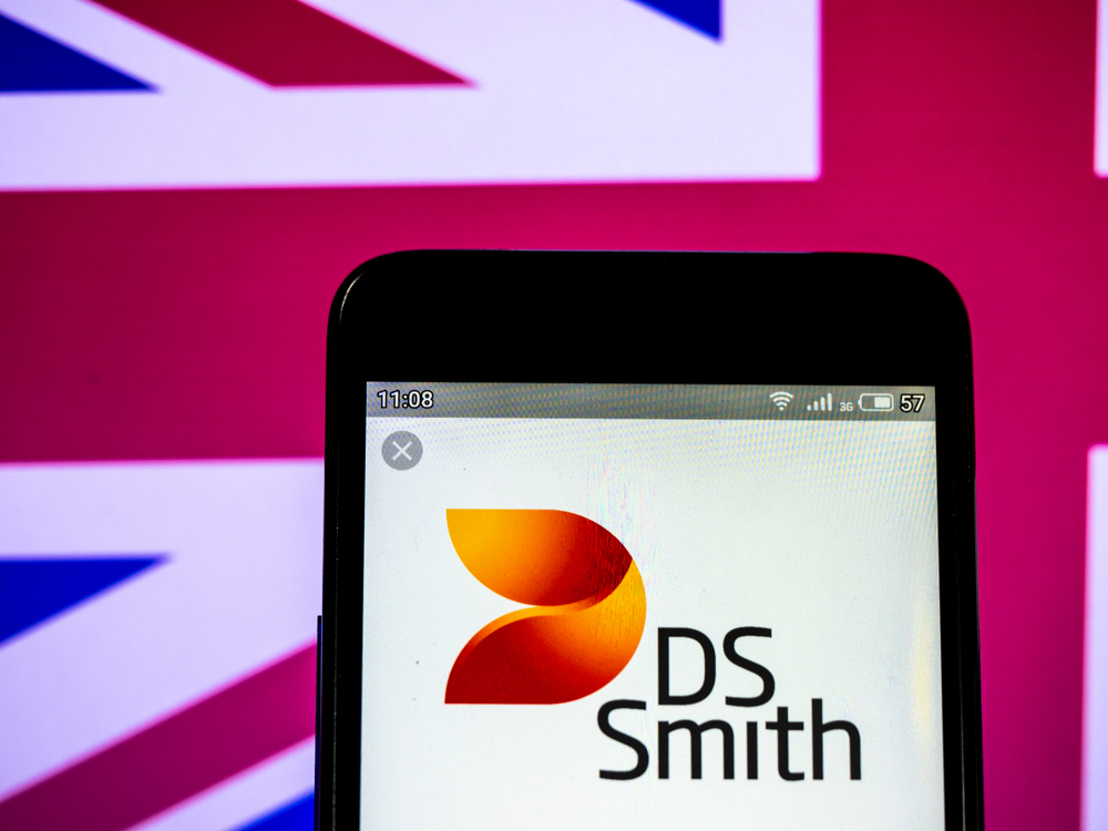 DS Smith plc logo seen displayed on a smart phone against Union Jack flag